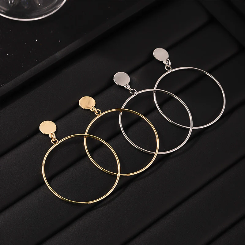 Bold Geometric Gold Alloy Hoop Earrings - Image 4