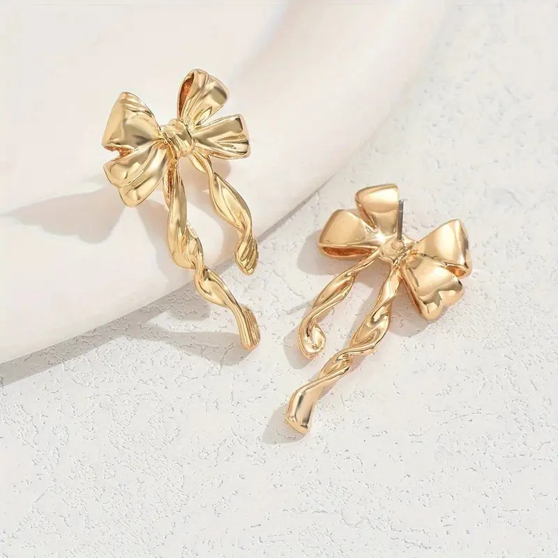 Elegant Golden Bow Dangle Earrings - Image 3